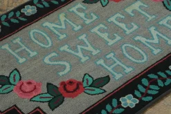 Antiker Teppich mit floralen Mustern