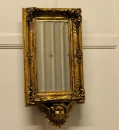 Vergoldeter Wandspiegel im Rokoko-Stil mit Putti und Regalhalterung, 1970